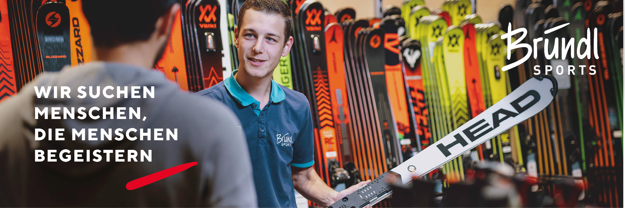 Skiverleih Mitarbeiter mit Ski